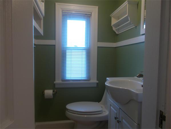 170 Lucerne Road Springfield, MA 01119 - Photo 24 of 28 a bathroom with a toilet sink and mirror
