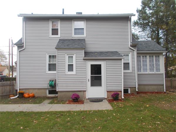 170 Lucerne Road Springfield, MA 01119 - Photo 5 of 28 a view of a white house with a yard