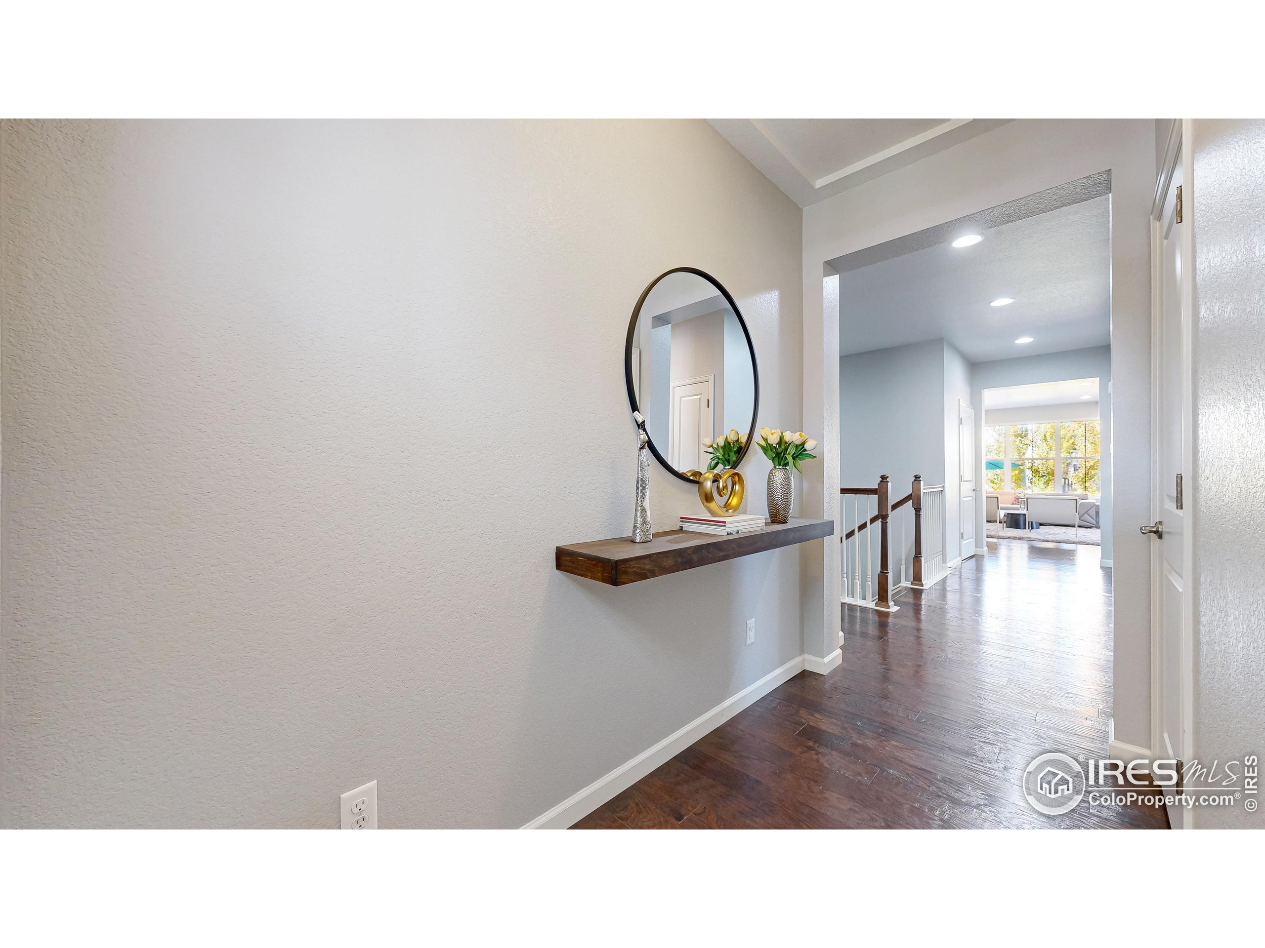 6794 Spring Rain Road Timnath, CO 80547 - Photo 13 of 49 a picture of a living room and a sink