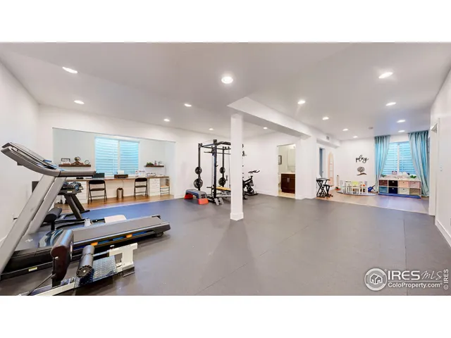 a kitchen with a table and chairs