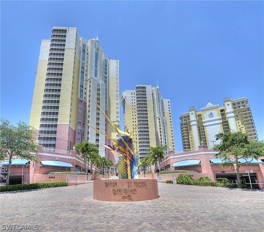 a view of a city with tall buildings