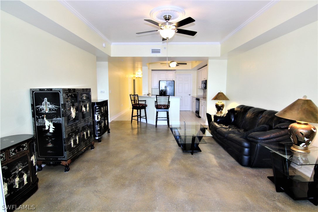 2797 First Street, Unit 804 Fort Myers, FL 33916 - Photo 16 of 34 a living room with furniture and wooden floor