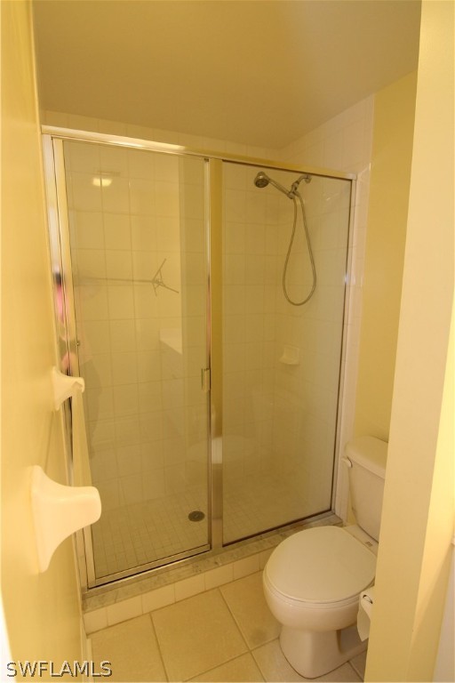 2797 First Street, Unit 804 Fort Myers, FL 33916 - Photo 31 of 34 a bathroom with a shower and toilet