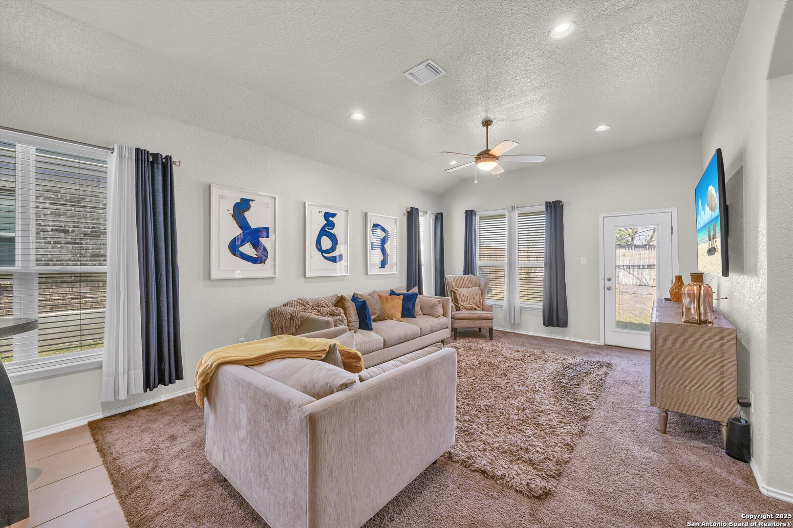 7235 Lunar Eclipse Converse, TX 78109 - Photo 11 of 29 a living room with furniture and a large window