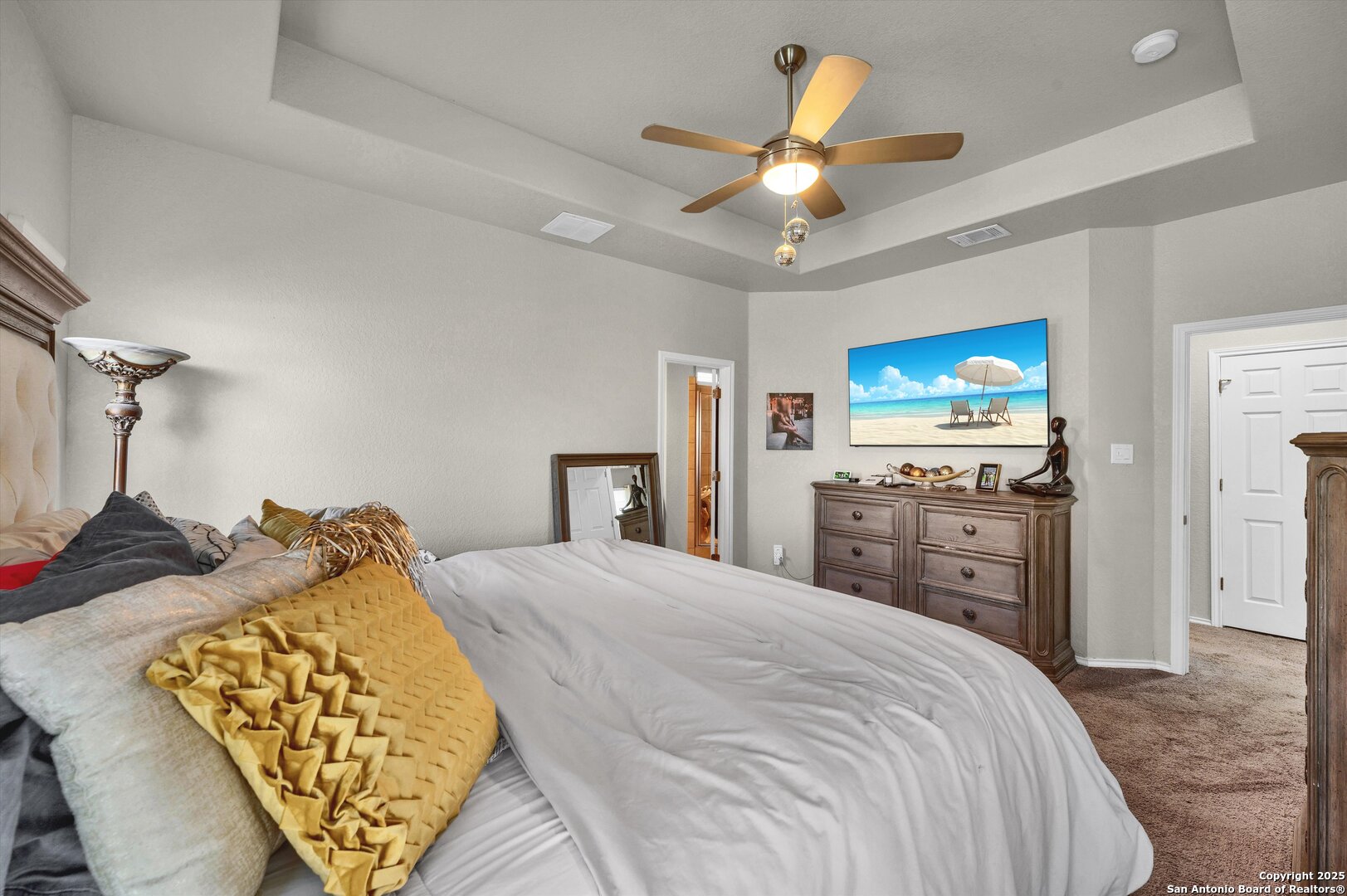 7235 Lunar Eclipse Converse, TX 78109 - Photo 14 of 29 a bedroom with a bed and a chandelier