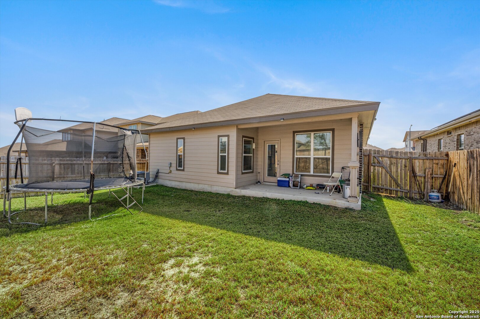 7235 Lunar Eclipse Converse, TX 78109 - Photo 25 of 29 a view of a house with a backyard