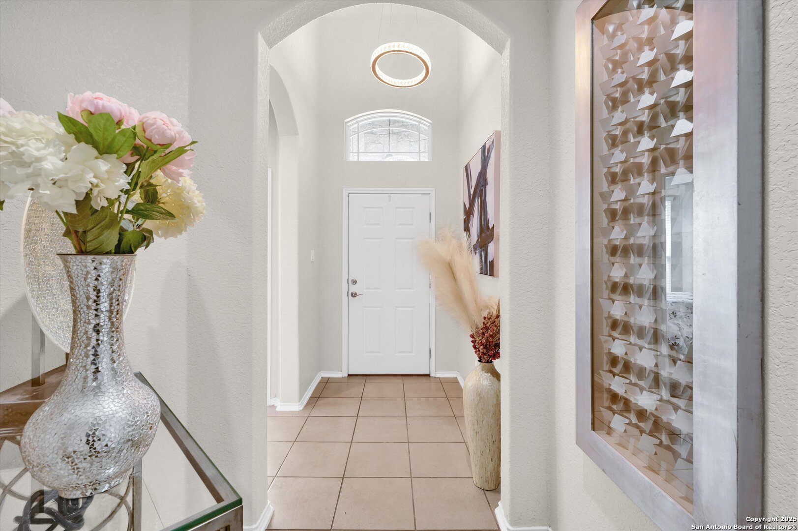 7235 Lunar Eclipse Converse, TX 78109 - Photo 4 of 29 a view of entryway with wooden floor