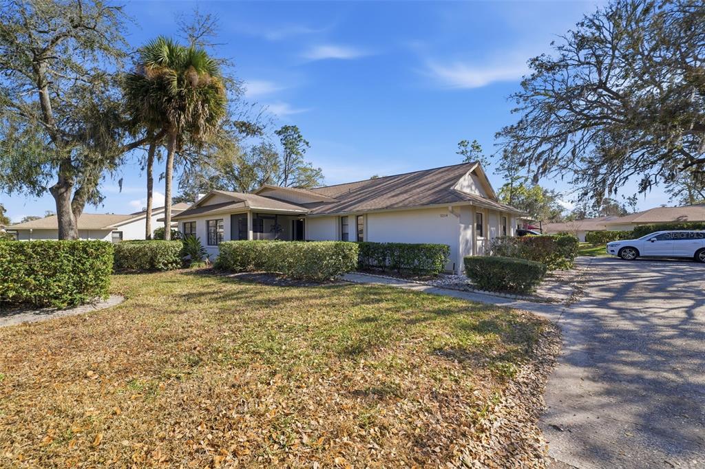 9204 Golf View Drive New Port Richey, FL 34655 - Photo 23 of 39 a view of a house with a yard