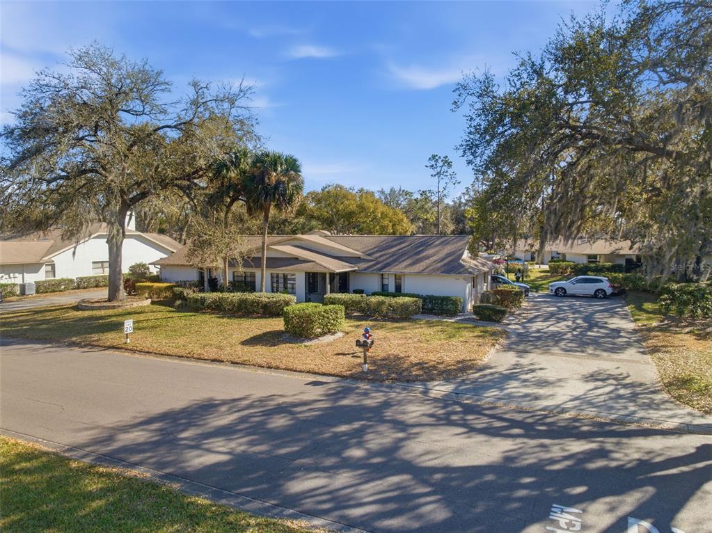 9204 Golf View Drive New Port Richey, FL 34655 - Photo 27 of 39 a view of a house with pool and sitting area