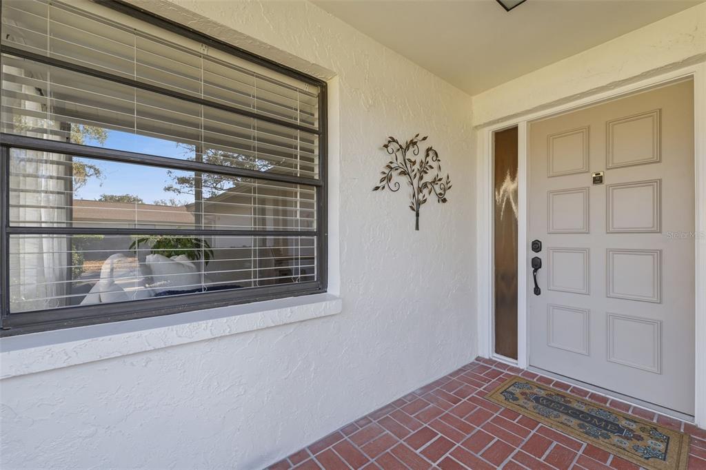 9204 Golf View Drive New Port Richey, FL 34655 - Photo 3 of 39 wooden floor in a empty room