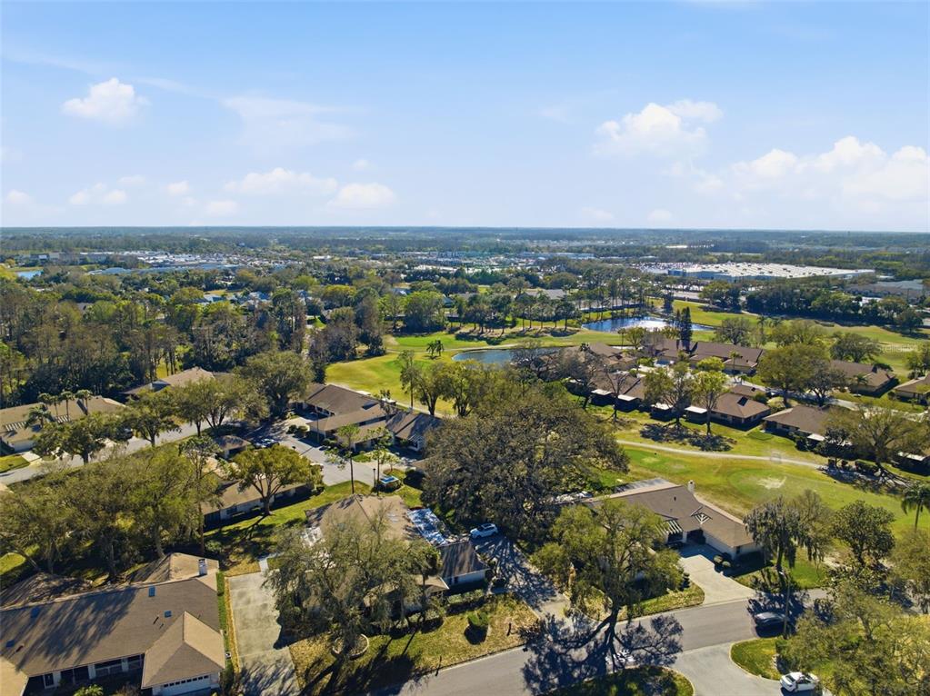 9204 Golf View Drive New Port Richey, FL 34655 - Photo 31 of 39 an aerial view of residential houses with outdoor space