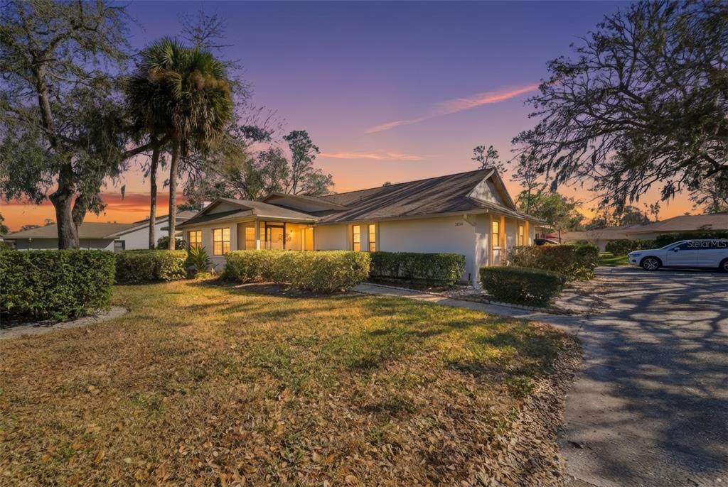 9204 Golf View Drive New Port Richey, FL 34655 - Photo 39 of 39 a view of a house with a yard and garage