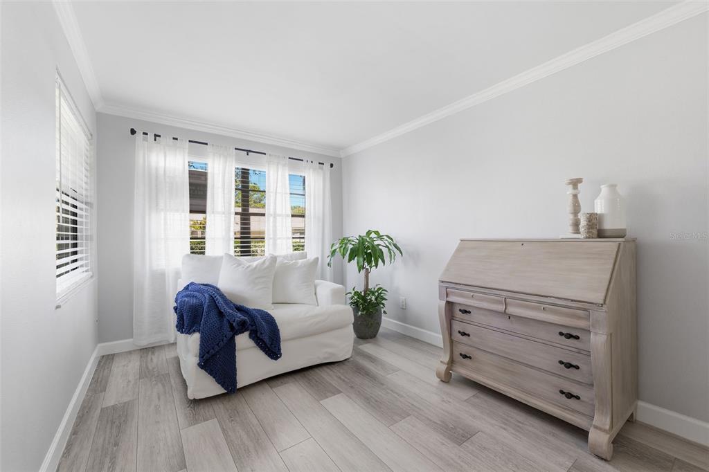 9204 Golf View Drive New Port Richey, FL 34655 - Photo 7 of 39 a living room with furniture and wooden floor