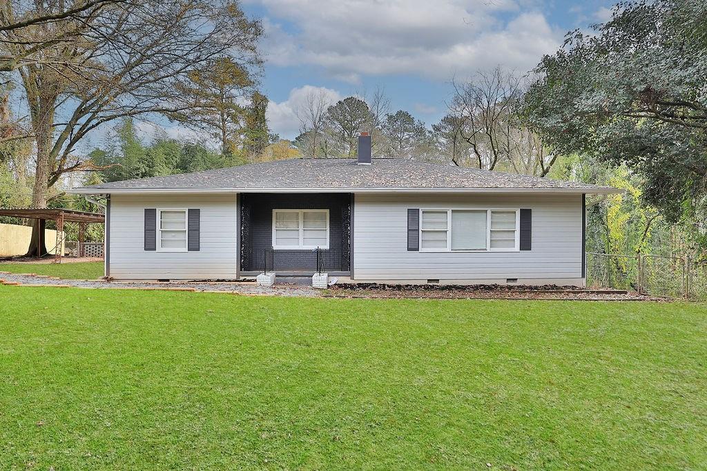 2800 Jonesboro Road Southeast Atlanta, GA 30354 - Photo 1 of 1 Single story home with a front yard