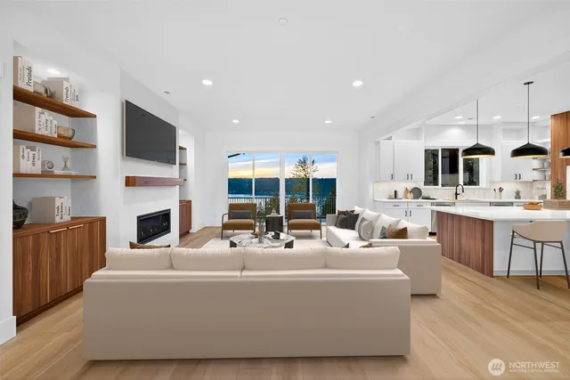 a living room with furniture fireplace and a flat screen tv