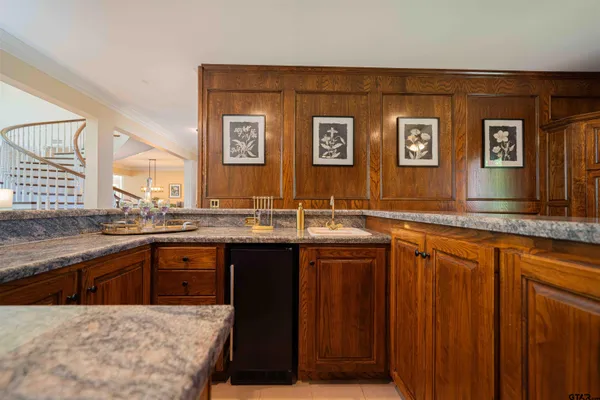 a bath tub sitting in a bathroom next to a window