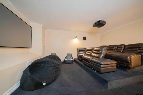 a bedroom with a bed and a table