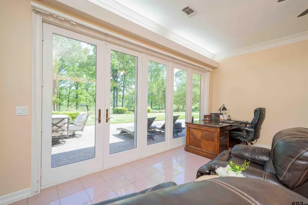a bathroom with a double vanity sink toilet and shower