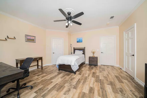 a view of a garden with a houses