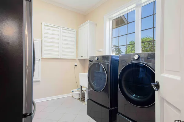 a view of swimming pool with seating space