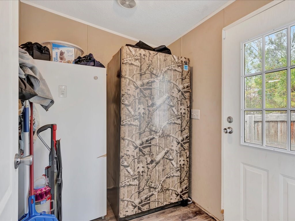 412 Ridge Trail Trinity, TX 75862 - Photo 16 of 39 a view of walk in closet with clothes and shoes