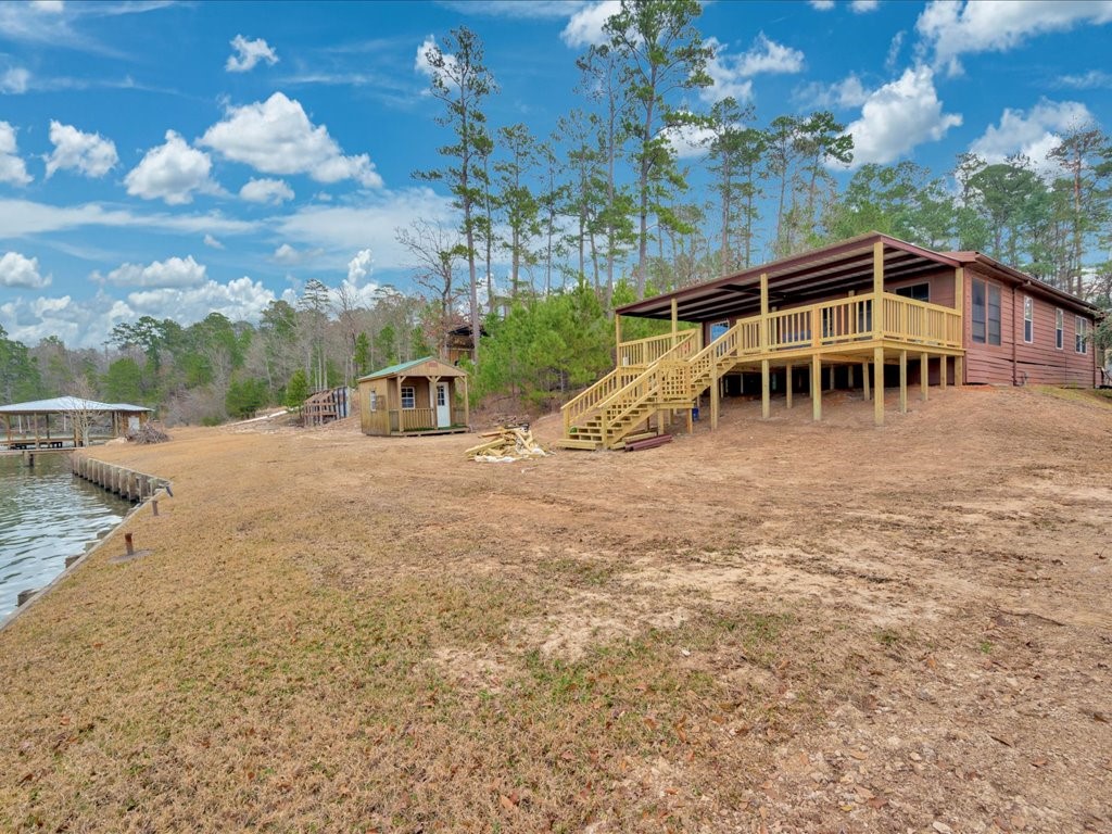 412 Ridge Trail Trinity, TX 75862 - Photo 27 of 39 a view of a house with a yard