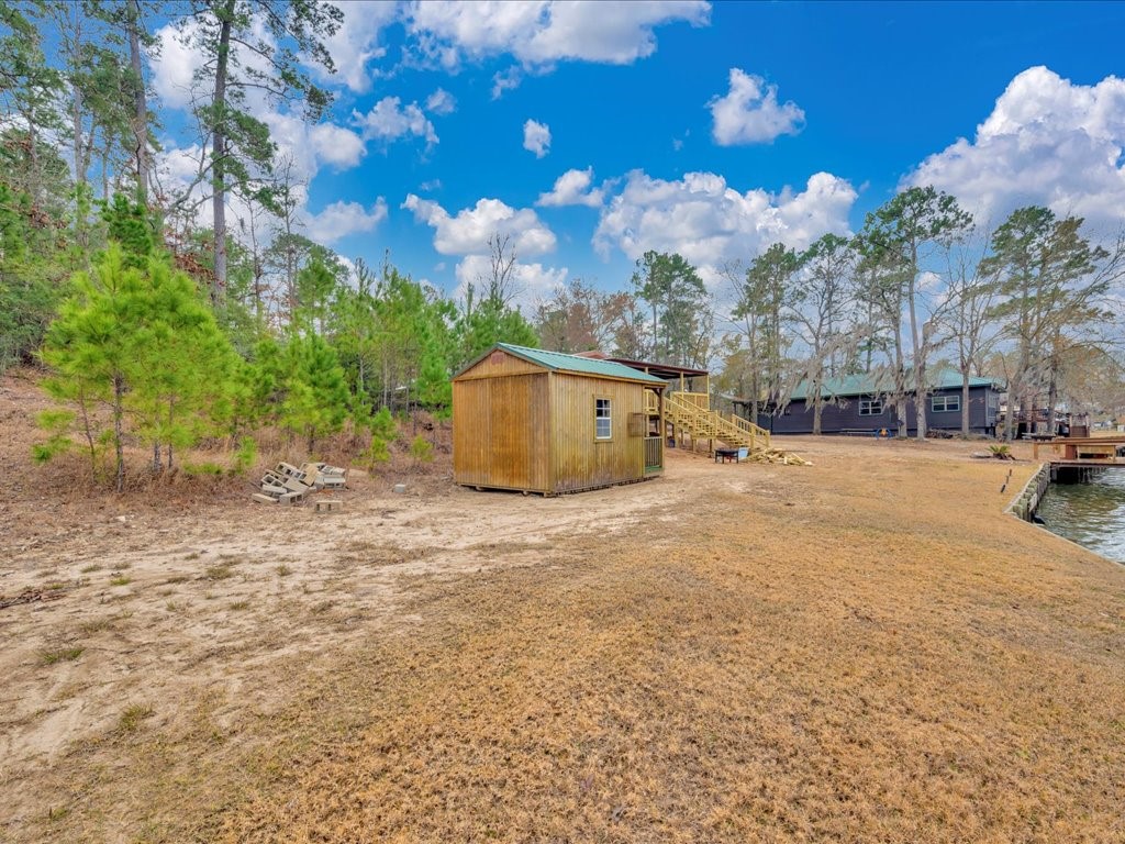 412 Ridge Trail Trinity, TX 75862 - Photo 30 of 39 a view of a outdoor space with a swimming pool