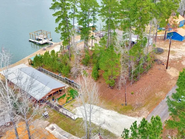 a aerial view of a house with a yard