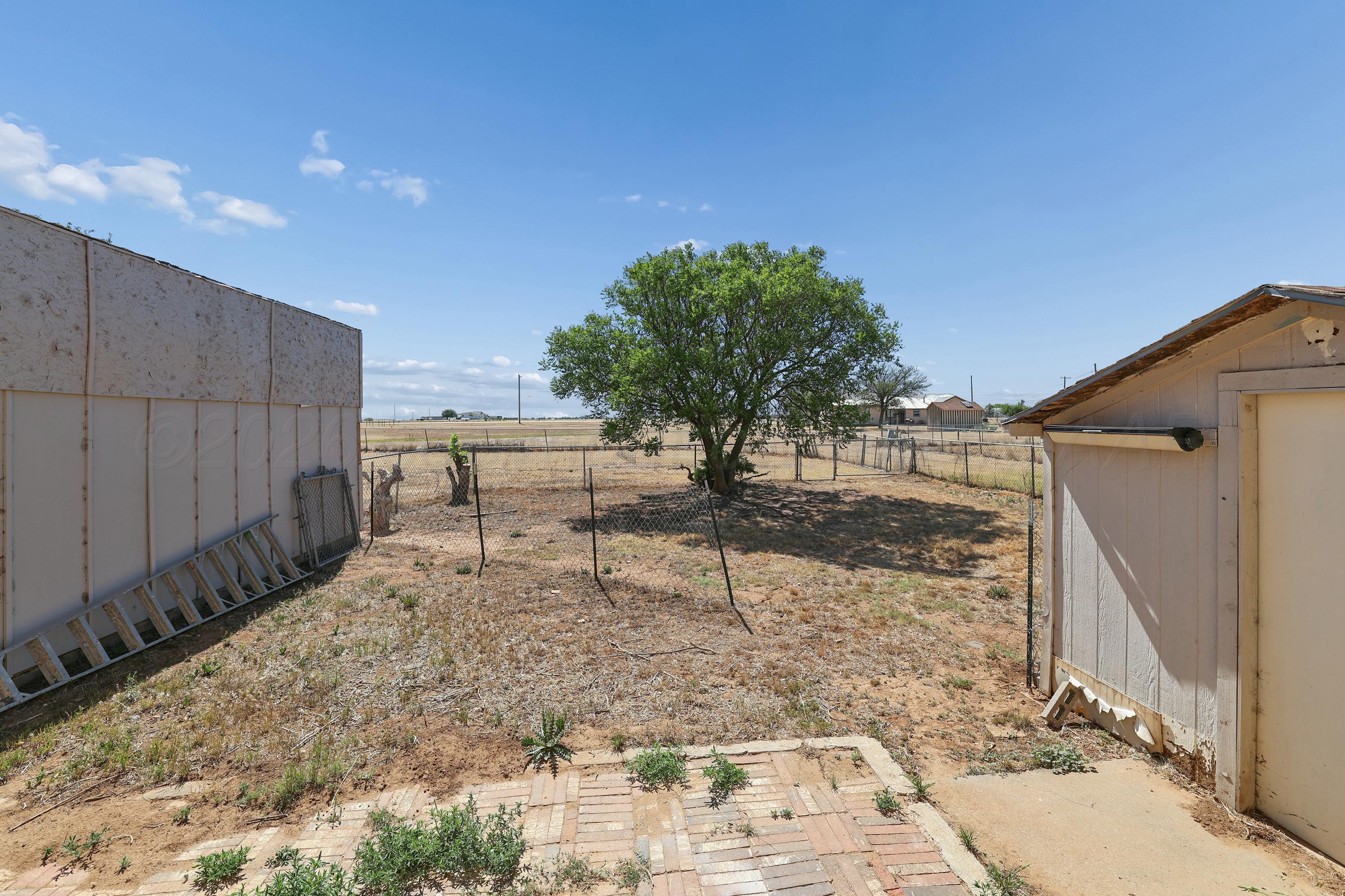 14200 Savannah Road Amarillo, TX 79118 - Photo 26 of 34 a view of a backyard