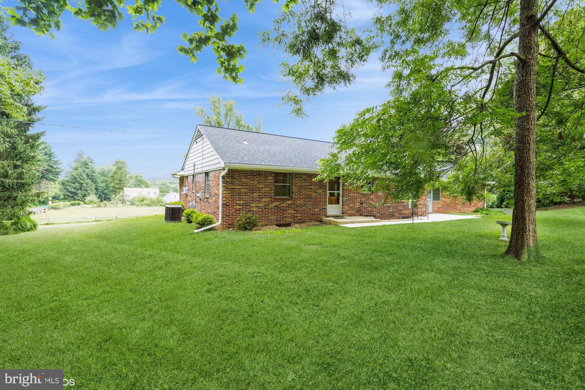 505 Whitaker Mill Road Fallston, MD 21047 - Photo 48 of 49 a view of a backyard with a garden