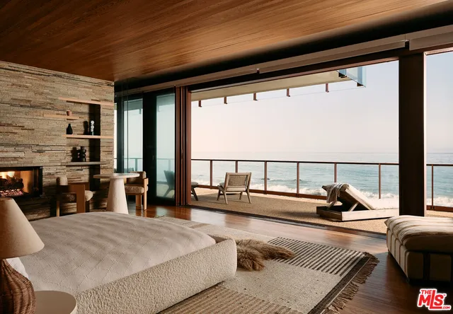 a living room with furniture fireplace and flat screen tv