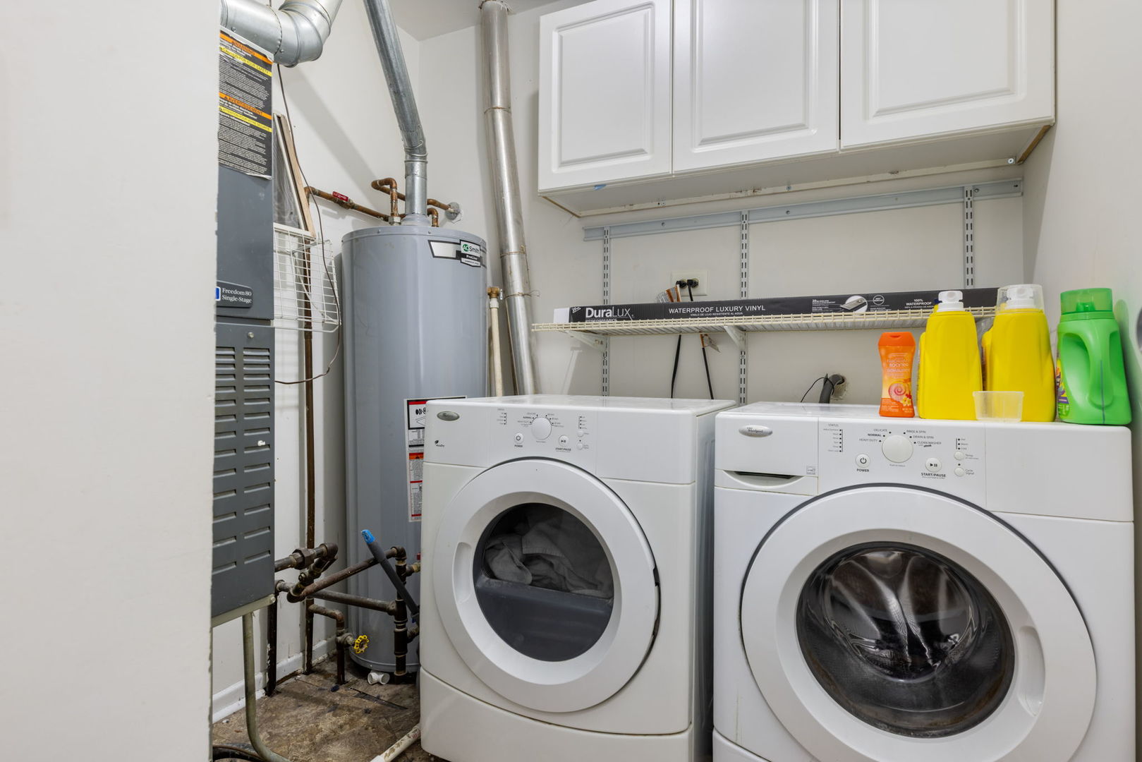 1055 Hampton Harbor, Unit 1055 Schaumburg, IL 60193 - Photo 13 of 14 a view of entryway with washer and dryer