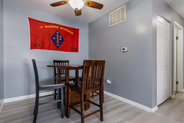 a view of a dining room with furniture