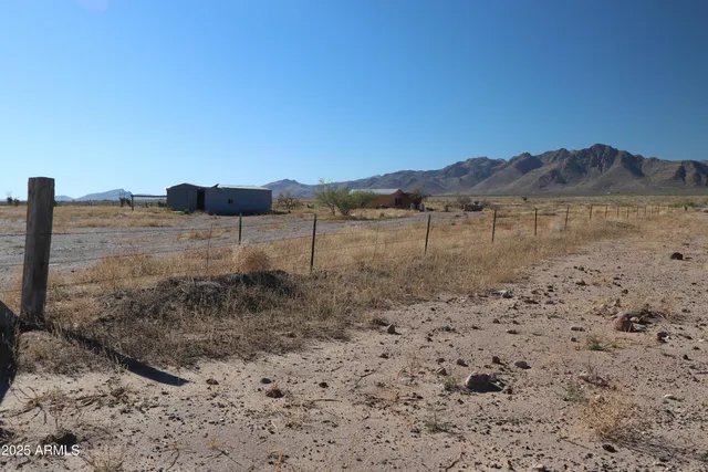 a view of lake with mountain in the background