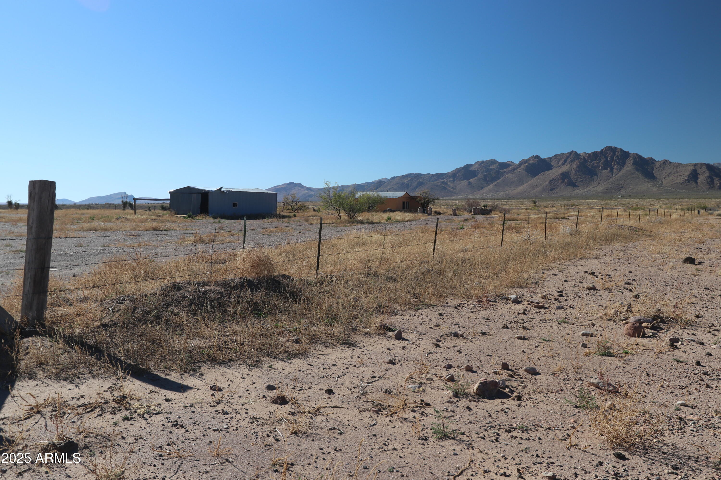 11730 North Hideout Ranch Road San Simon, AZ 85632 - Photo 13 of 14 a view of lake with mountain in the background