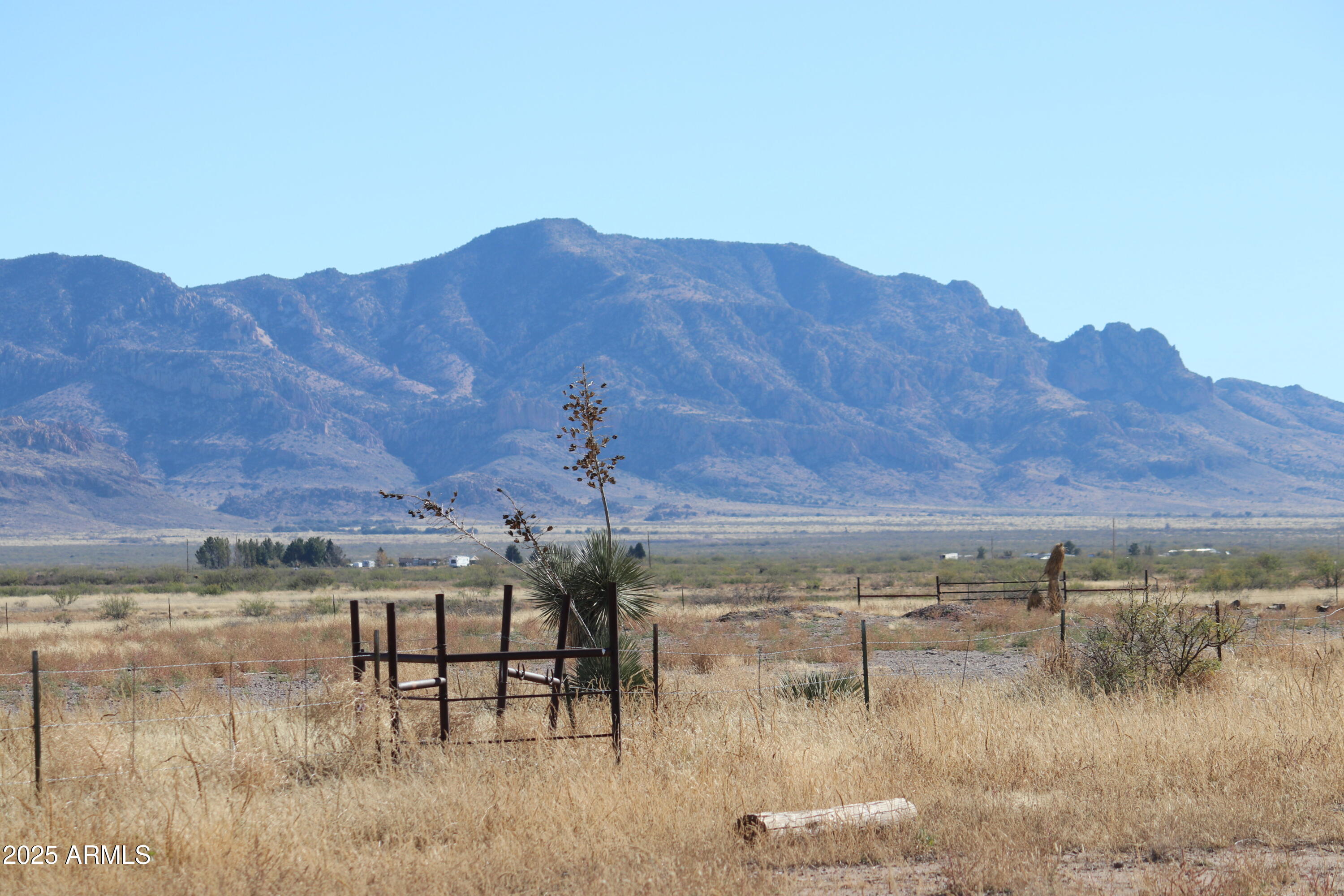 11730 North Hideout Ranch Road San Simon, AZ 85632 - Photo 8 of 14 a view of a lake with a mountain in the background