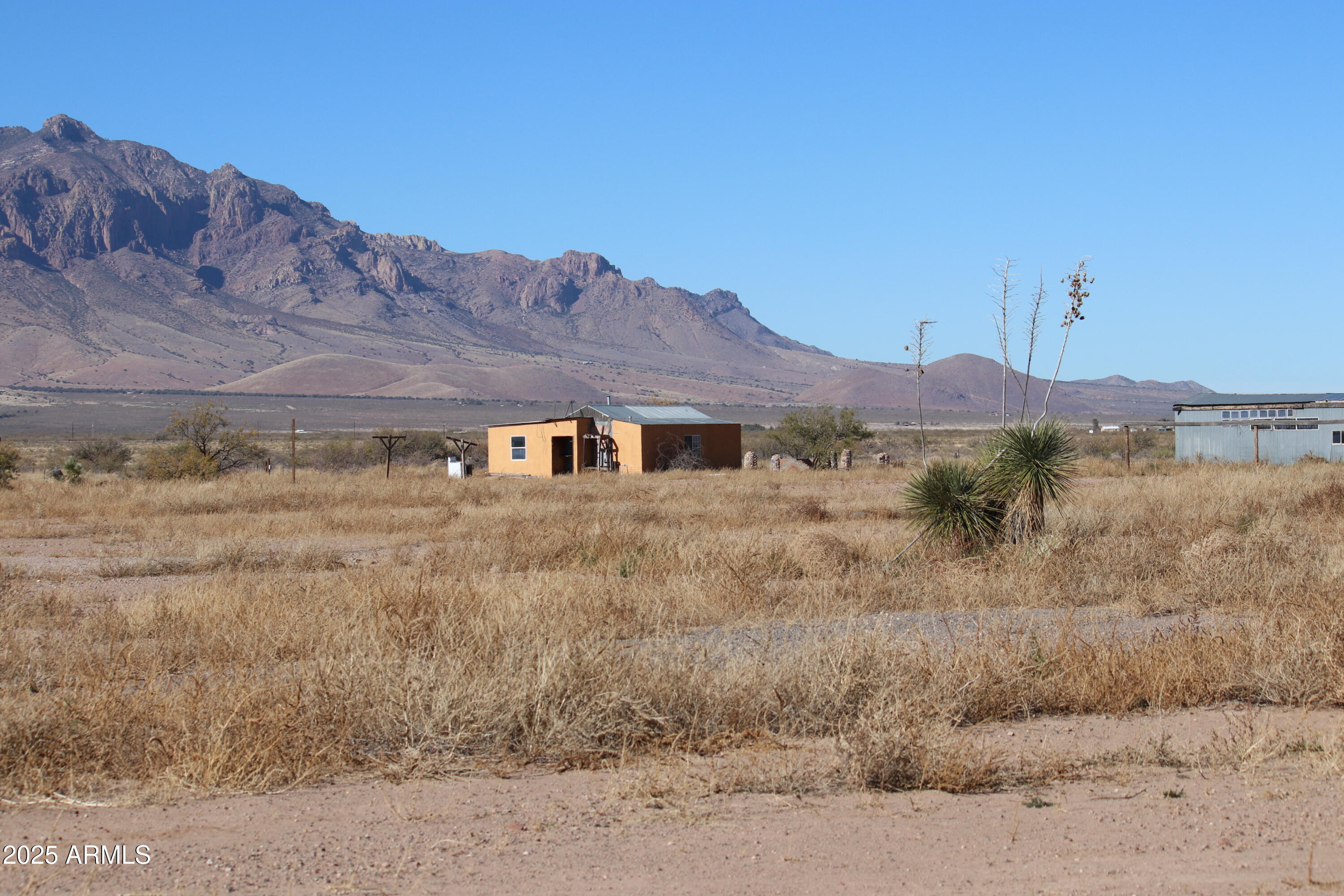 11730 North Hideout Ranch Road San Simon, AZ 85632 - Photo 10 of 14 a front view of a house with a yard