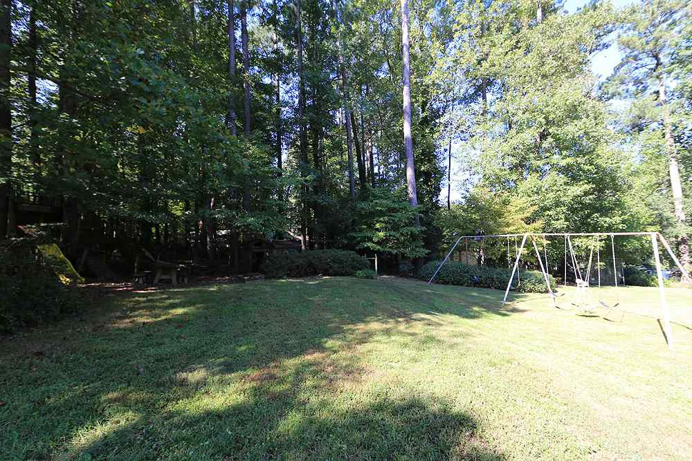 4005 Picardy Drive Raleigh, NC 27612 - Photo 18 of 19 Wonderful corner lot, with a backyard that beckons play time! Backyard