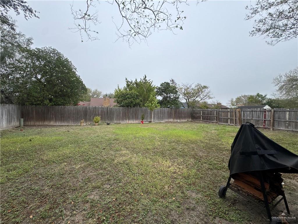 2018 West Adrian Street Harlingen, TX 78552 - Photo 13 of 13 a view of a backyard with plants and trees