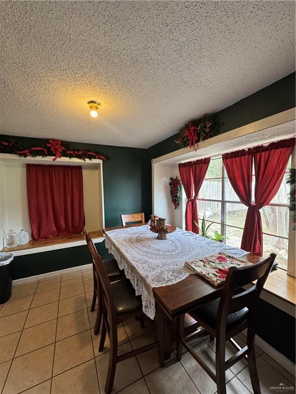 2018 West Adrian Street Harlingen, TX 78552 - Photo 8 of 13 a view of a dining room with furniture window and outside view