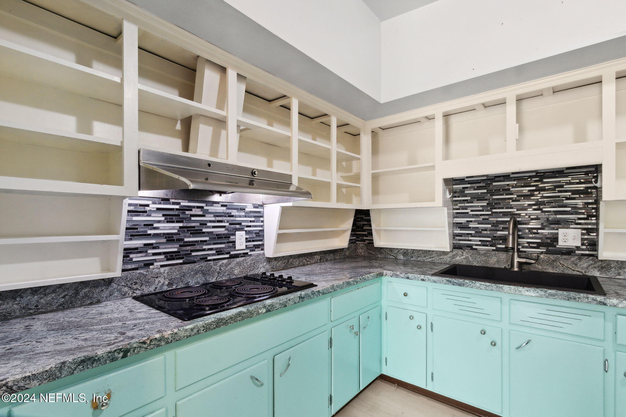 2770 Scott Circle Jacksonville, FL 32223 - Photo 16 of 33 a kitchen with granite countertop a sink and a stove