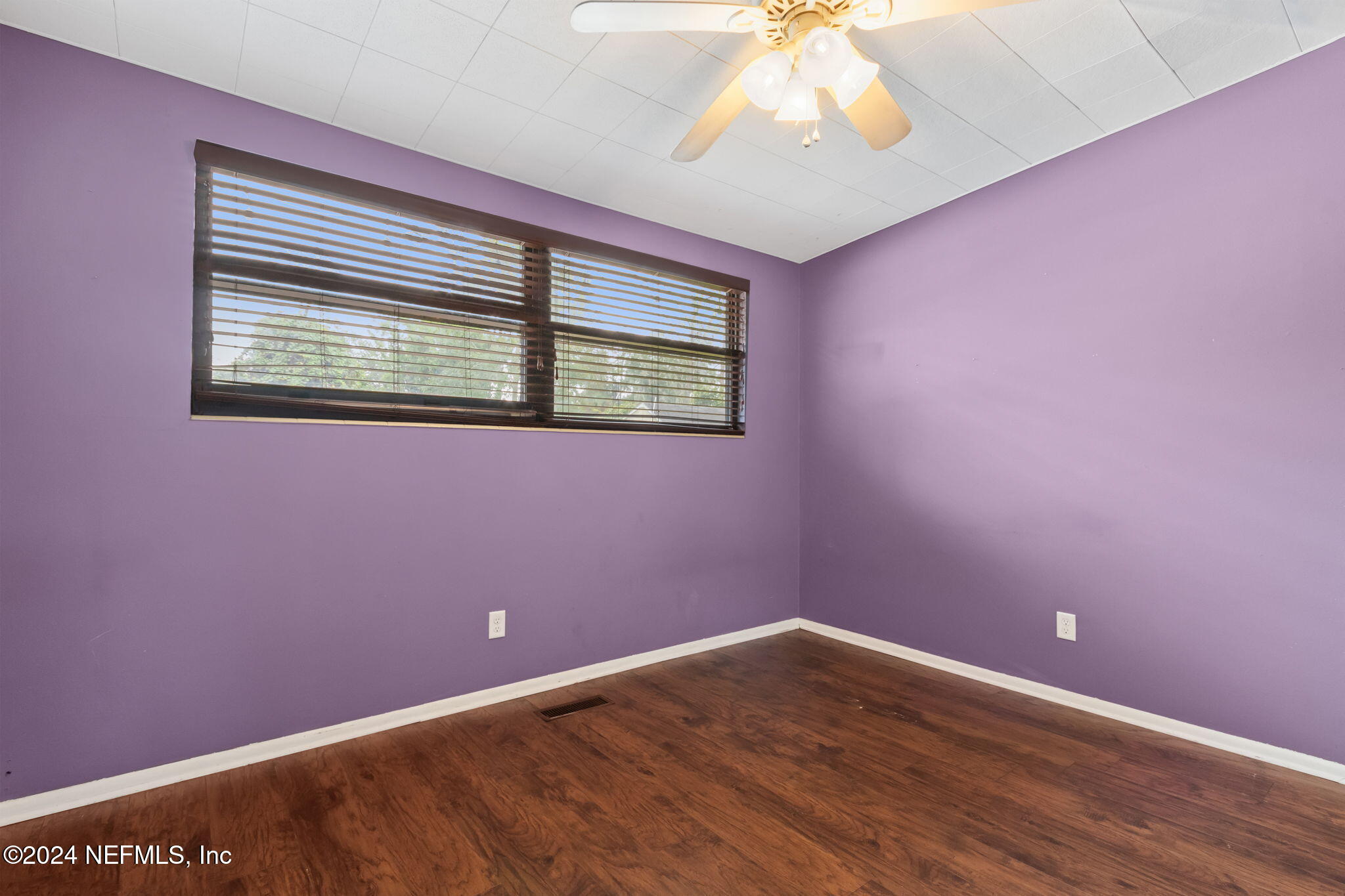 2770 Scott Circle Jacksonville, FL 32223 - Photo 22 of 33 a view of an empty room with a window