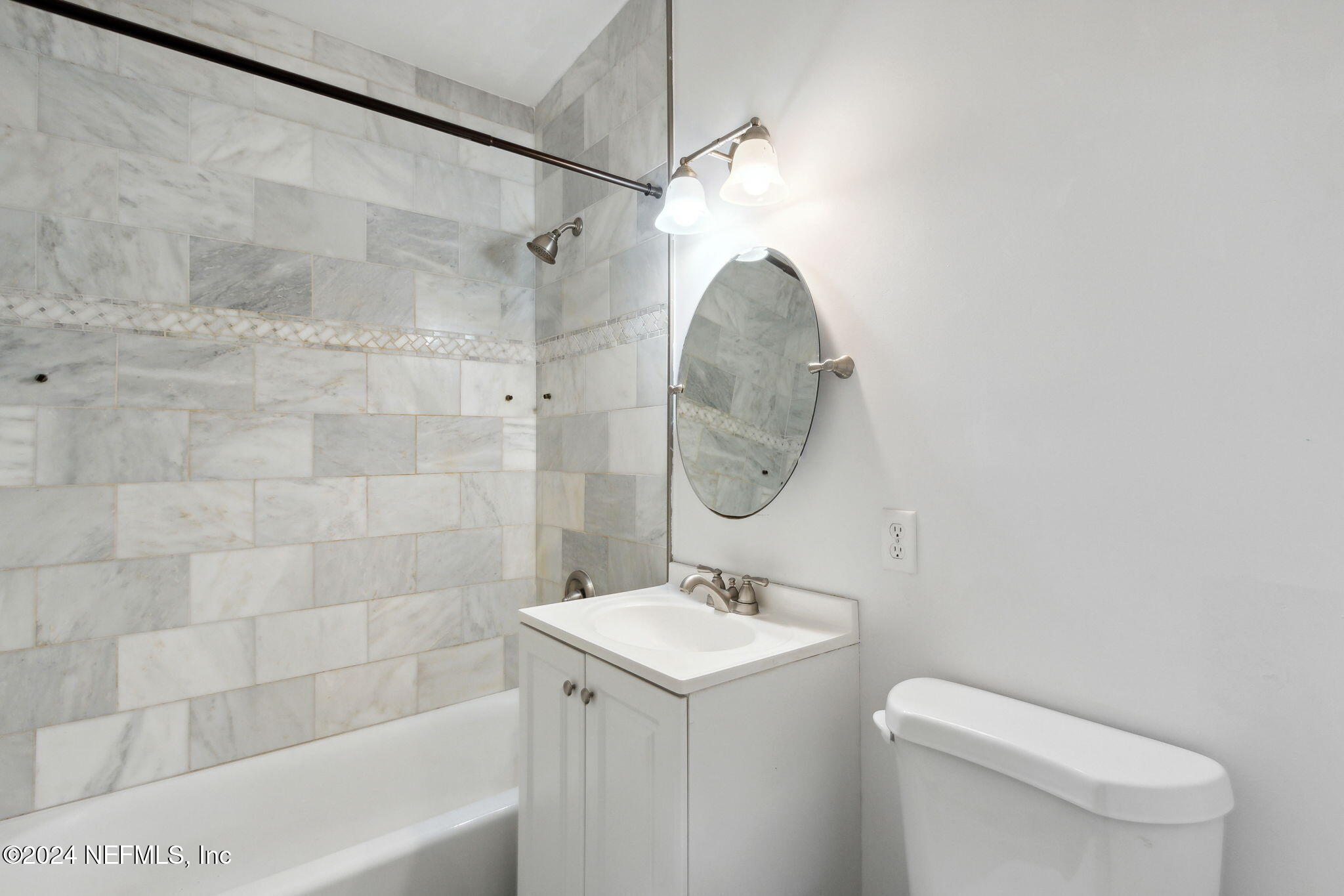 2770 Scott Circle Jacksonville, FL 32223 - Photo 25 of 33 a bathroom with a sink a toilet and shower