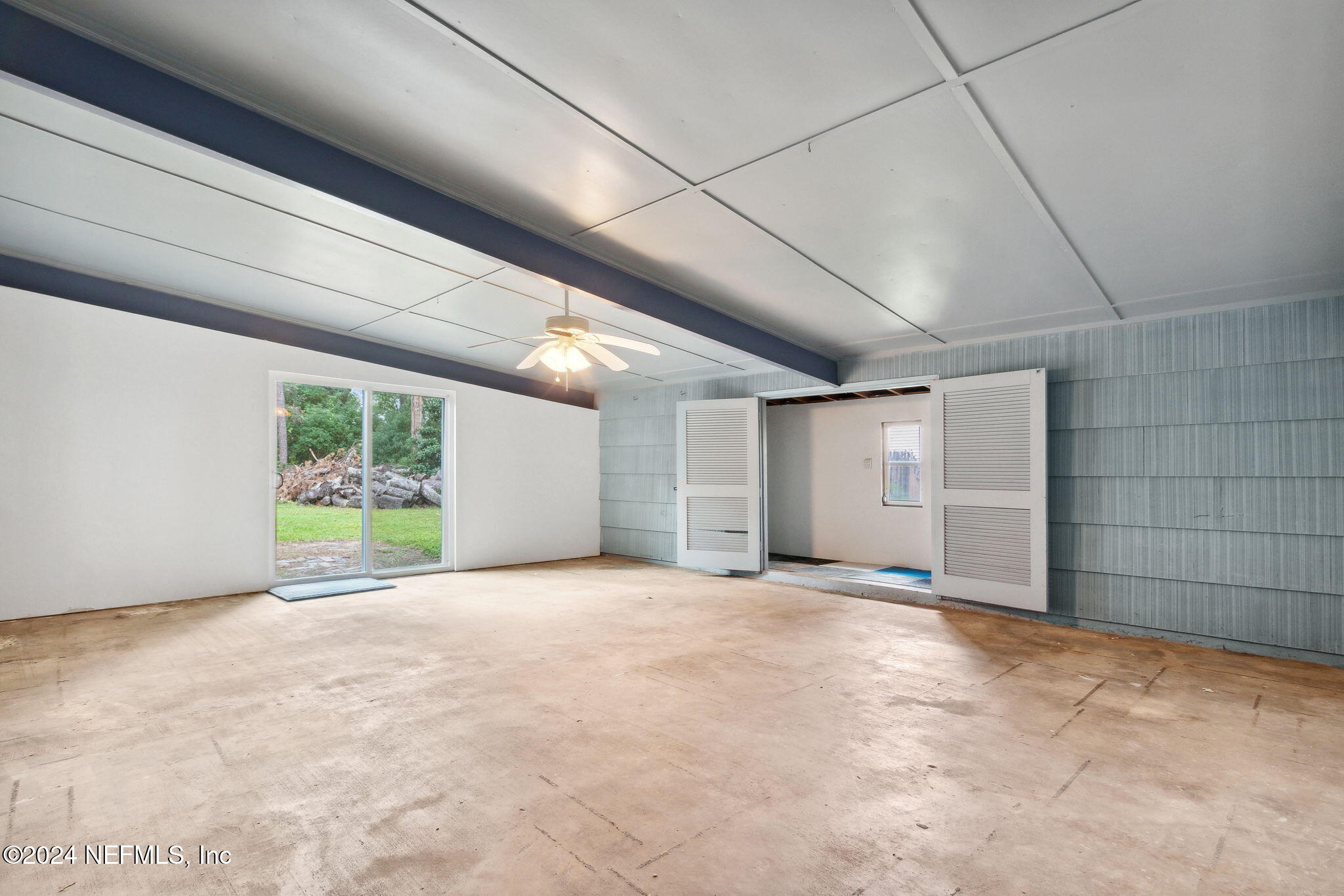 2770 Scott Circle Jacksonville, FL 32223 - Photo 27 of 33 a view of a livingroom with an empty space and a window