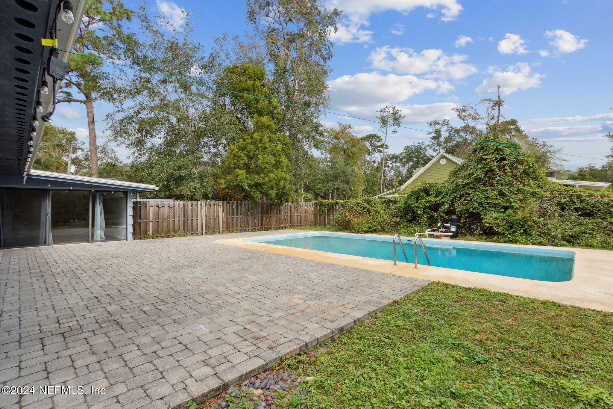 2770 Scott Circle Jacksonville, FL 32223 - Photo 31 of 33 a backyard of a house with lots of green space