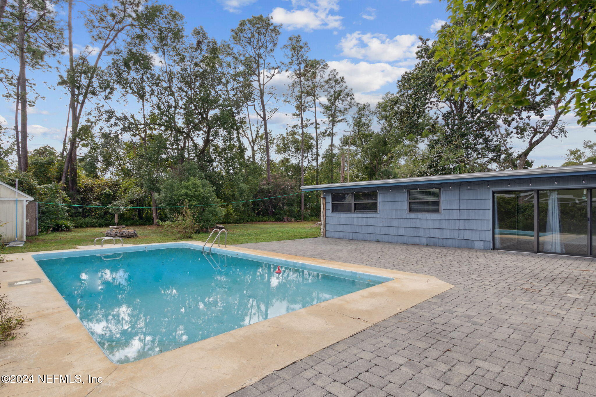 2770 Scott Circle Jacksonville, FL 32223 - Photo 4 of 33 a view of a swimming pool with a yard