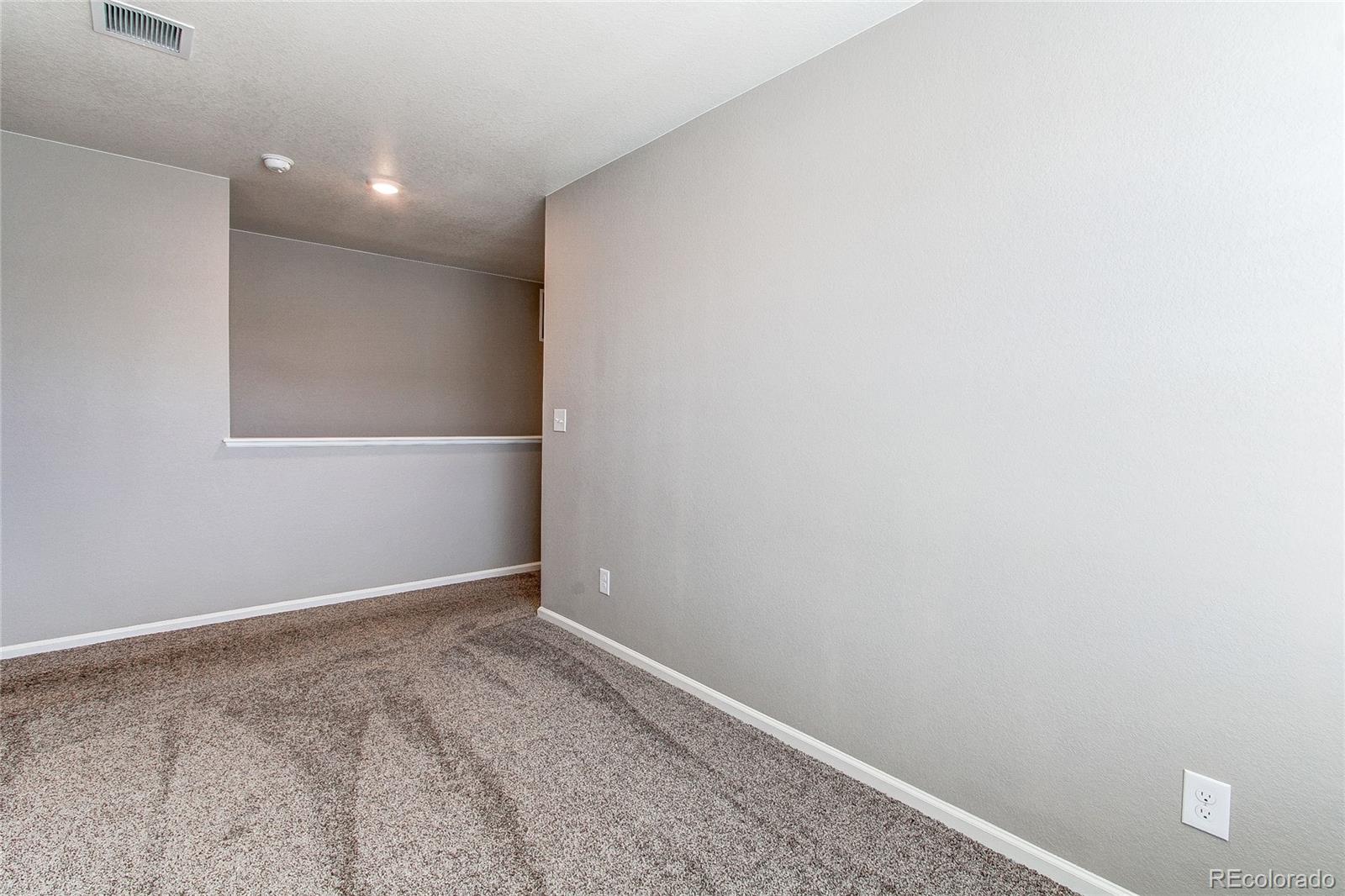 10099 Cascade Street Firestone, CO 80504 - Photo 29 of 46 a view of an empty room