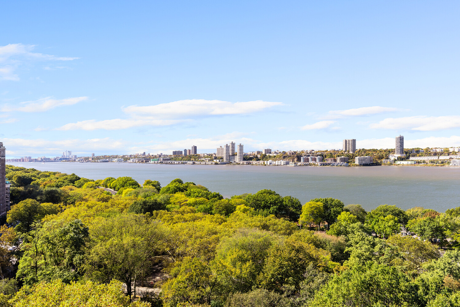 265 Riverside Drive, Unit 11F Manhattan, NY 10025 - Photo 9 of 10 a view of a lake with houses