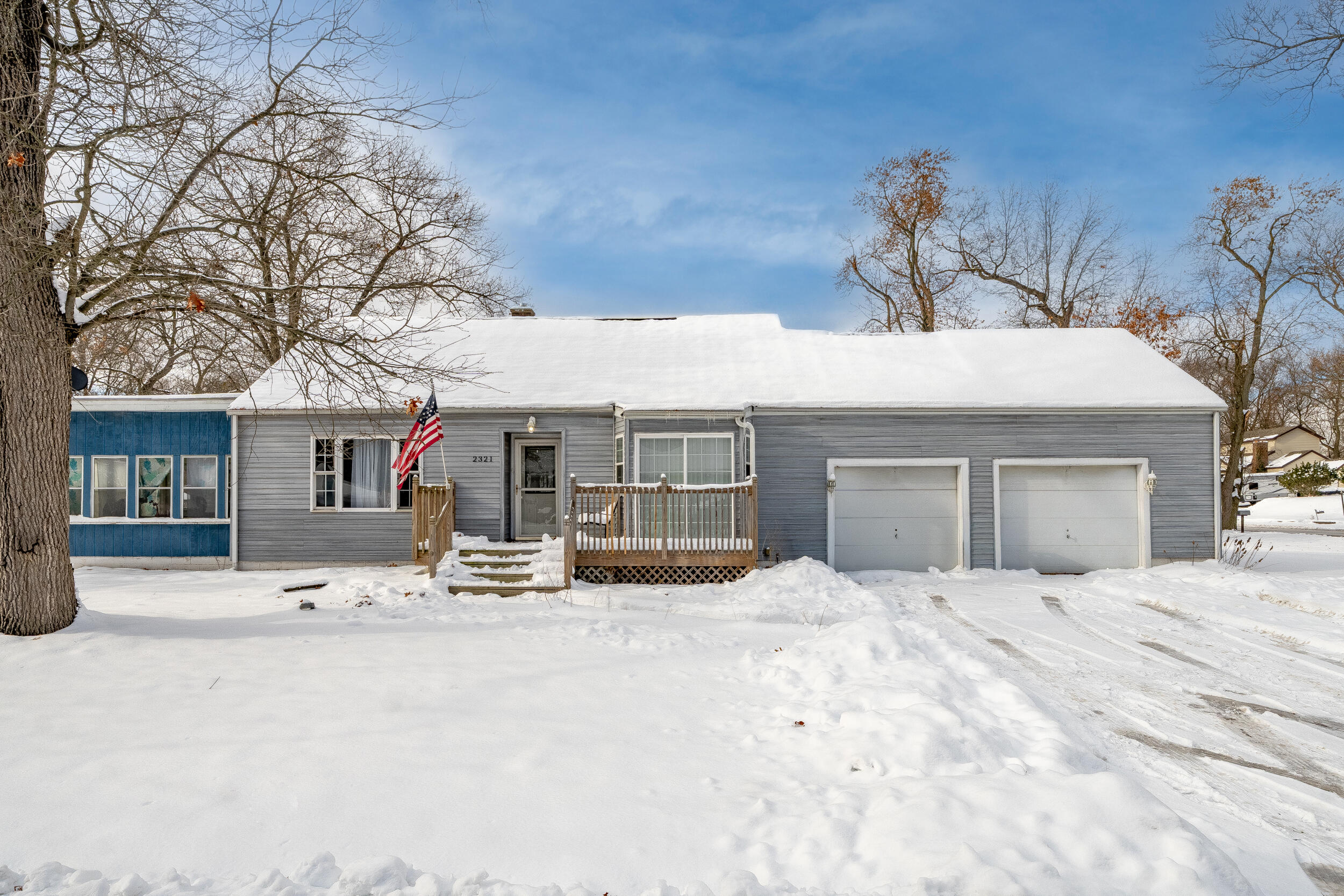 2321 Crest Road Gary, IN 46408 - Photo 1 of 22 a view of a house with a snow in front of it