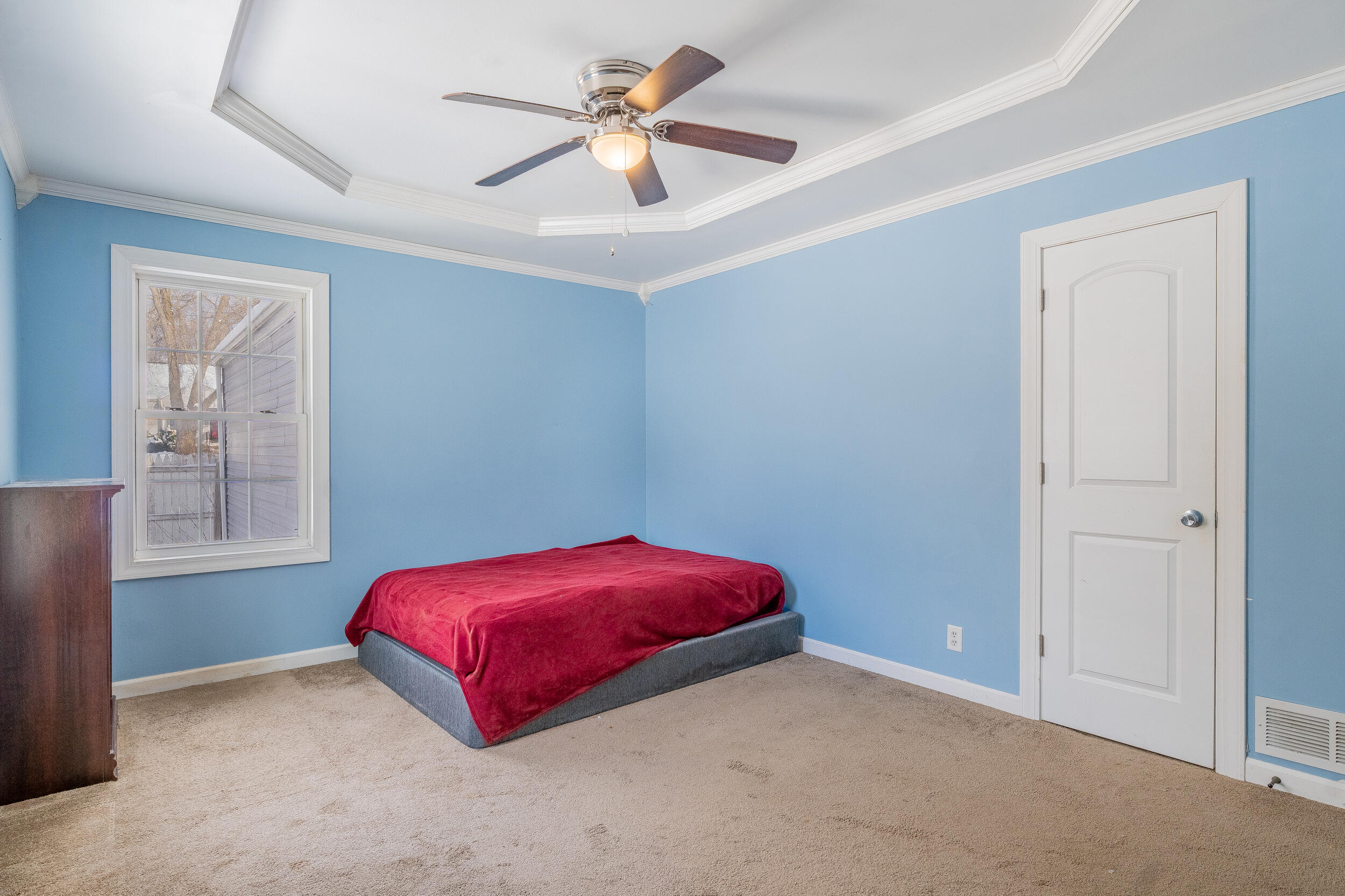 2321 Crest Road Gary, IN 46408 - Photo 12 of 22 an empty room with windows and fan